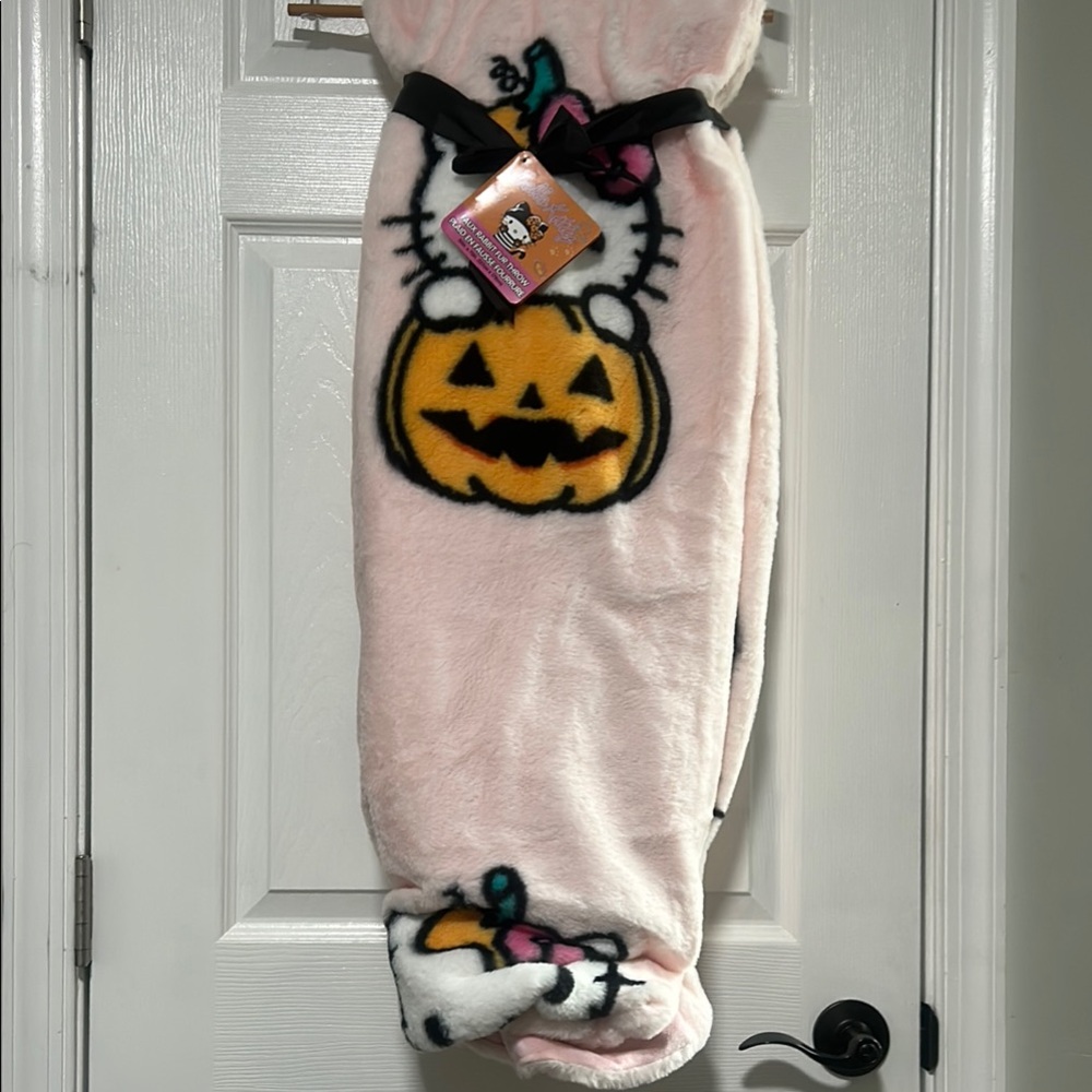 Sanrio Pink Halloween Blanket with Pumpkin Design